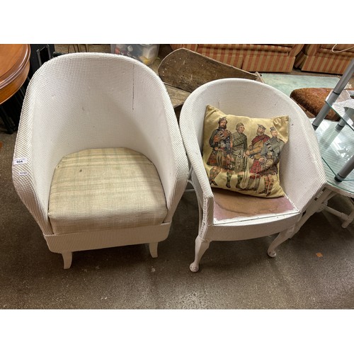 604 - Two Lloyd loom white tub chairs (2)