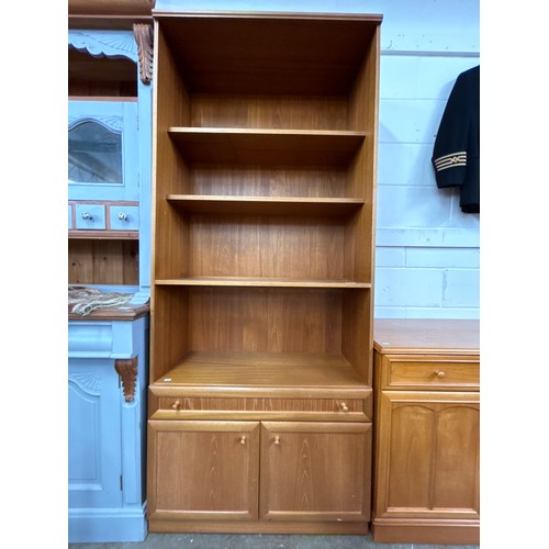 605 - Stag sideboard, bookcase with drawer and cupboard  (2)