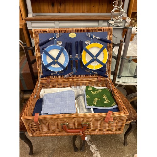 610 - Harrods wicker picnic hamper, with contents including plates, thermos cutlery etc