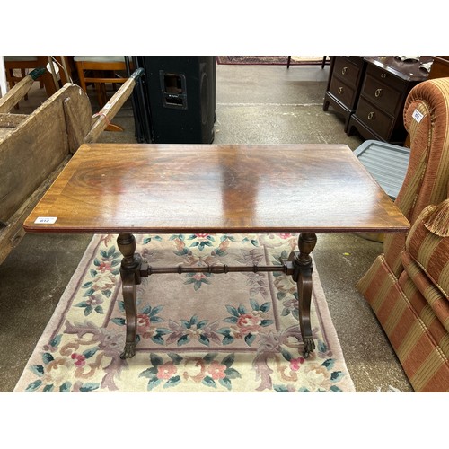 612 - Walnut topped occasional table on clawed feet 80 x 50 cm