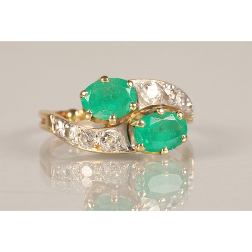 102 - Ladies Emerald and Diamond ring, two oval cut emeralds in twist setting with four graduated diamonds... 