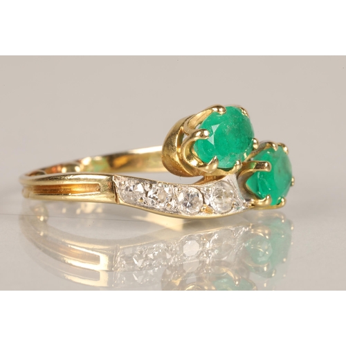 102 - Ladies Emerald and Diamond ring, two oval cut emeralds in twist setting with four graduated diamonds... 