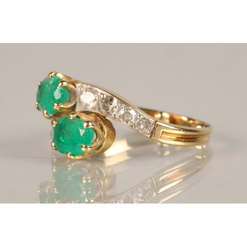 102 - Ladies Emerald and Diamond ring, two oval cut emeralds in twist setting with four graduated diamonds... 