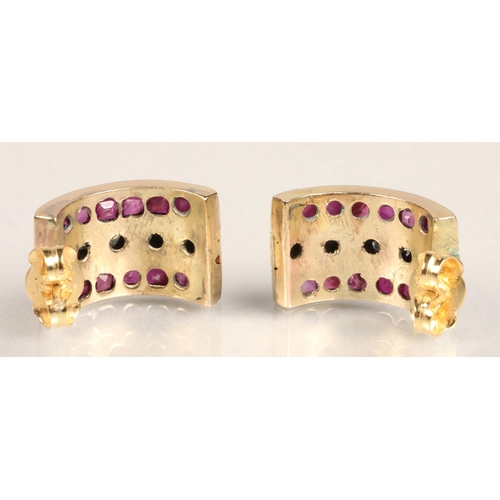 104 - Pair of ladies 18ct yellow gold Ruby and Diamond earrings, central row of five diamonds flanked by a... 