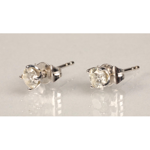 74 - Pair of ladies 18ct white gold diamond stud earrings, each stone 0.33 carat.