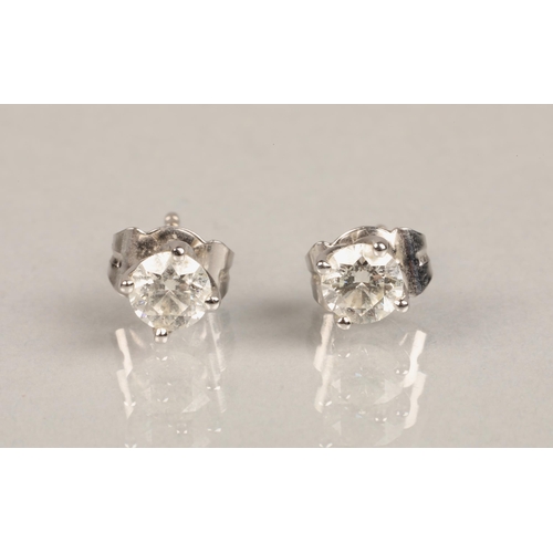 74 - Pair of ladies 18ct white gold diamond stud earrings, each stone 0.33 carat.