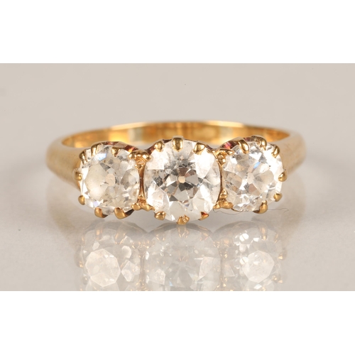 76 - Ladies three stone graduated diamond ring, mounted on yellow metal, central stone approximately 0.5 ... 