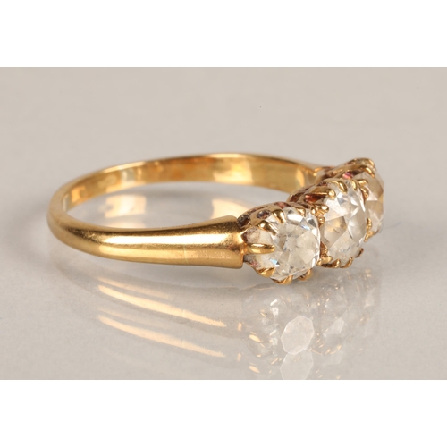 76 - Ladies three stone graduated diamond ring, mounted on yellow metal, central stone approximately 0.5 ... 