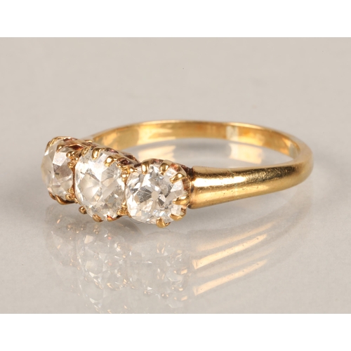 76 - Ladies three stone graduated diamond ring, mounted on yellow metal, central stone approximately 0.5 ... 