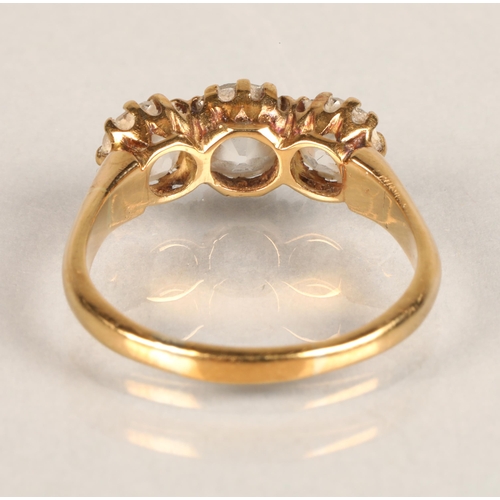 76 - Ladies three stone graduated diamond ring, mounted on yellow metal, central stone approximately 0.5 ... 