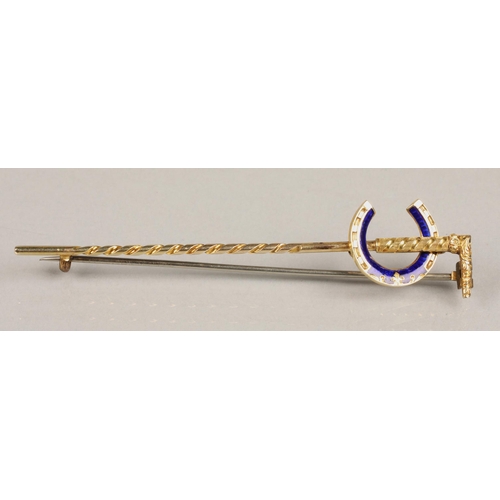 95 - Ladies yellow metal brooch in the form of a walking stick with blue enamelled letter C, in a fitted ... 