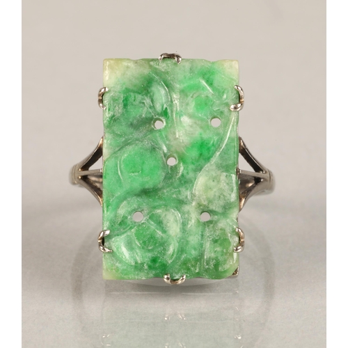 96 - Ladies carved jade ring,mounted on white metal, ring size L/M.