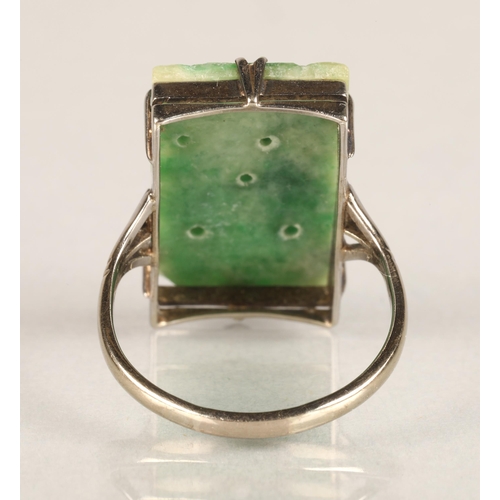 96 - Ladies carved jade ring,mounted on white metal, ring size L/M.