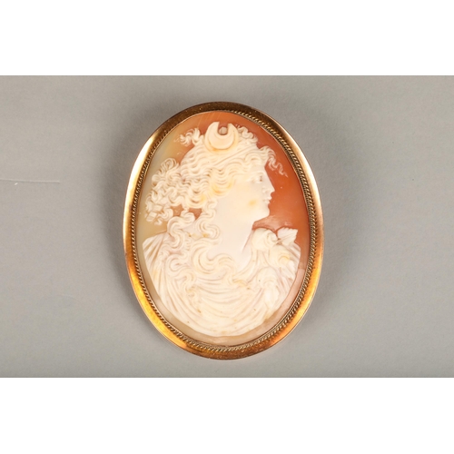 138 - Victorian 9ct gold framed shall cameo brooch, the shell carved in relief with depiction of Diana wit... 