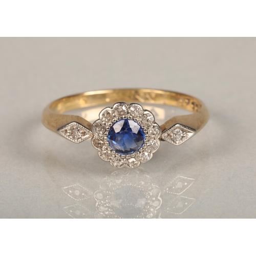 139 - An Art Deco period sapphire and diamond daisy cluster ring, the central round cut sapphire set betwe... 