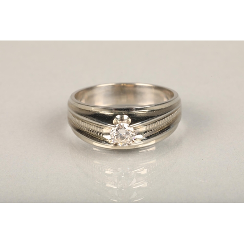 141 - 18ct white gold diamond solitaire ring, the brilliant cut diamond set in an integral mount flanked b... 