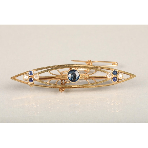 143 - An Art Deco period sapphire and diamond 18ct gold bar brooch, the  symmetrical wire work navette sha... 