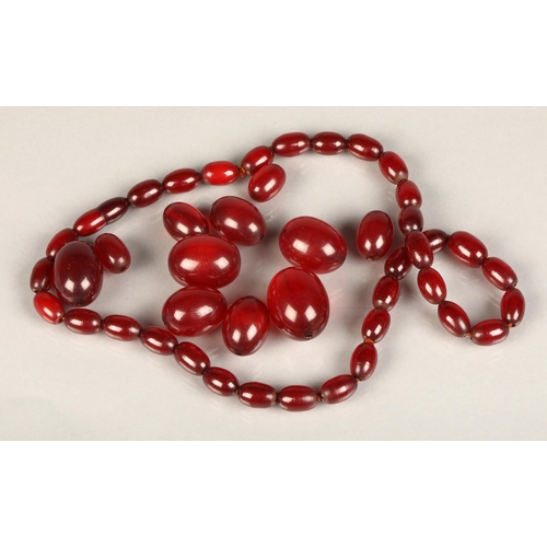 160 - Early to mid 20thC cherry amber or Bakelite beaded necklace with larger loose beads, max bead size 2... 