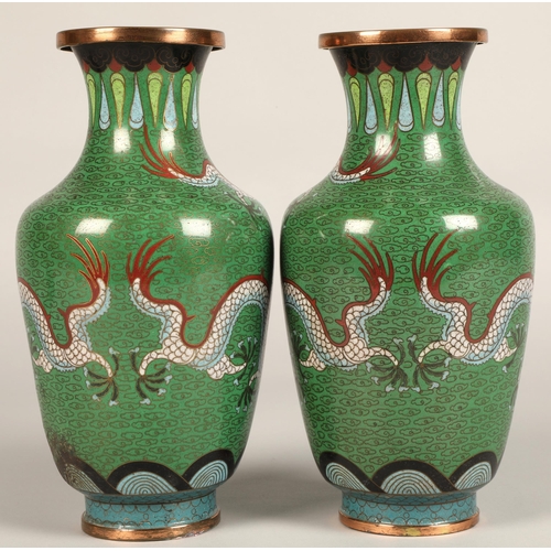 220 - Pair of Japanese cloisonne vases, green ground with coiled dragon, 23cm high.