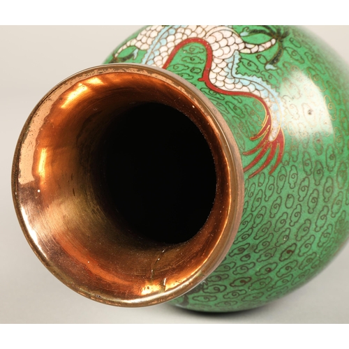 220 - Pair of Japanese cloisonne vases, green ground with coiled dragon, 23cm high.