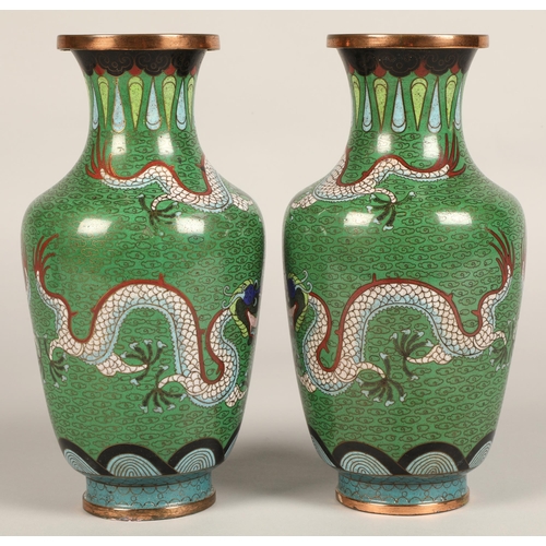 220 - Pair of Japanese cloisonne vases, green ground with coiled dragon, 23cm high.