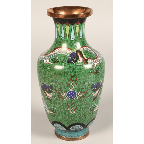 220 - Pair of Japanese cloisonne vases, green ground with coiled dragon, 23cm high.