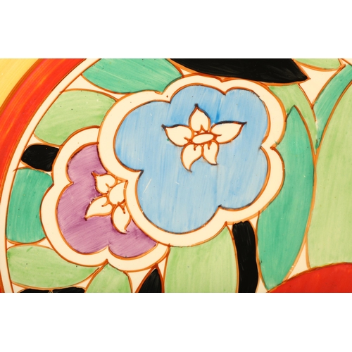 46 - Clarice Cliff Fantasque Bizarre wall charger, decorated in bright colours, diameter 34cm.