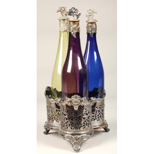 196 - Two silver plated decanter stands, with three glass decanters each.