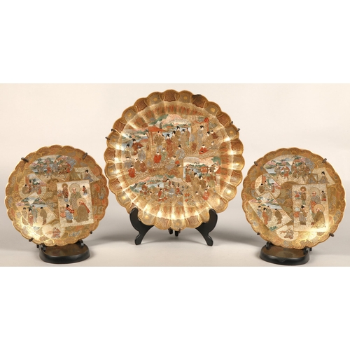 219 - Pair of satsuma scalloped edge plates, each with panels of figures, with a larger scalloped edge pla... 