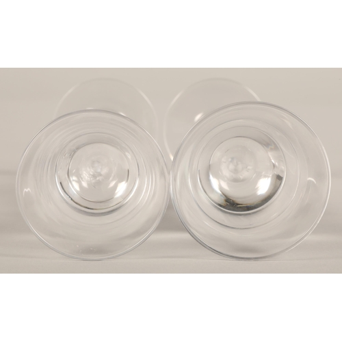 234 - Pair of glasses with frosted figure stems, 15cm high.