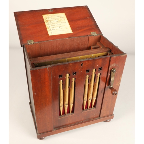 273 - A 19th century miniature chamber barrel organ, playing eight tunes on twelve keys with one rank of s... 