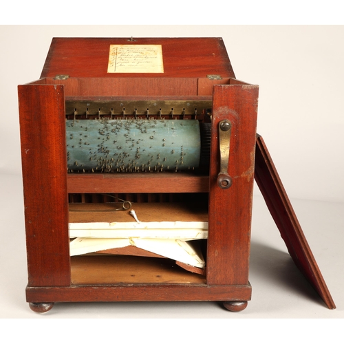 273 - A 19th century miniature chamber barrel organ, playing eight tunes on twelve keys with one rank of s... 