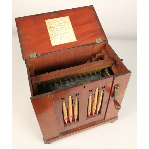 273 - A 19th century miniature chamber barrel organ, playing eight tunes on twelve keys with one rank of s... 