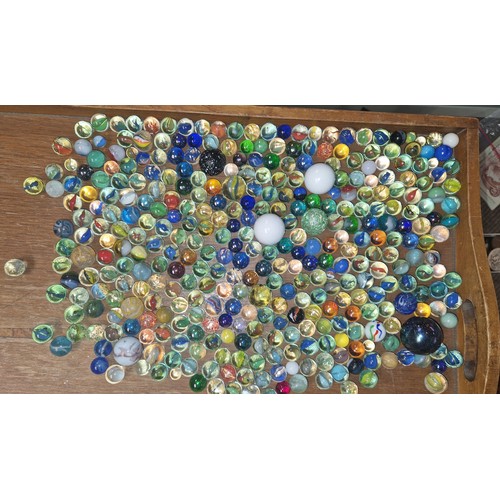 232 - Vintage oriental tin full of marbles