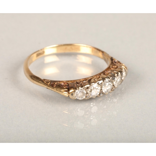 167 - 18ct yellow gold five stone diamond ring, the central stone slightly larger than 0.1cts, ring size N... 