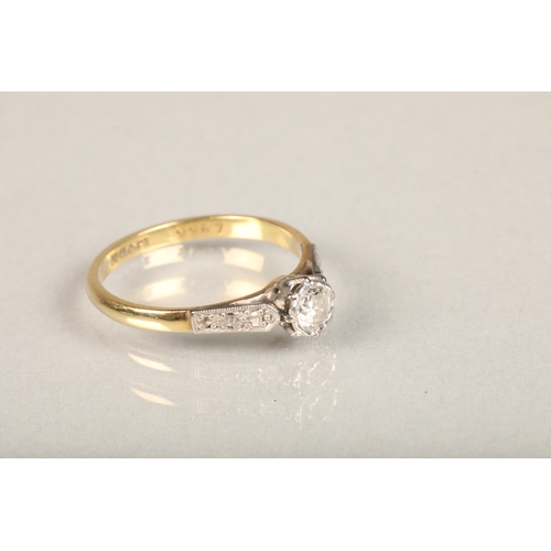 169 - 18ct yellow gold and platinum diamond solitaire ring, the diamond approximately 0.25cts flanked by d... 