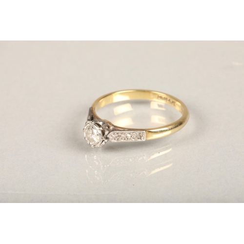 169 - 18ct yellow gold and platinum diamond solitaire ring, the diamond approximately 0.25cts flanked by d... 