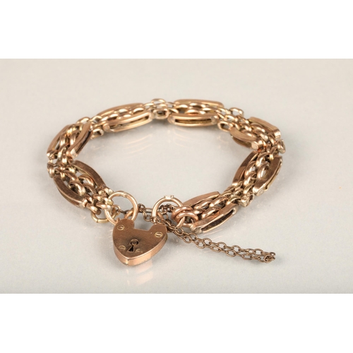 180 - 9ct gold bracelet with heart shaped padlock closure, 13.2g.