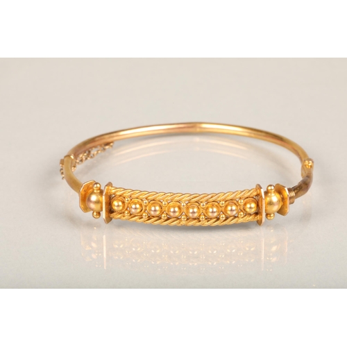 186 - Victorian 9ct gold bangle with ropetwist border and sphere ornamentation, stamped '9ct', 6.5g.