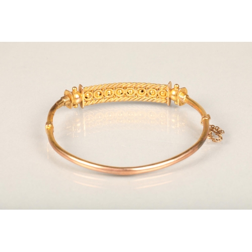 186 - Victorian 9ct gold bangle with ropetwist border and sphere ornamentation, stamped '9ct', 6.5g.