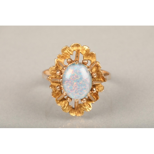 188 - 14ct yellow gold opal ring with 1970s Brutalist style setting, ring size Q, 3.5g gross and a yellow ... 