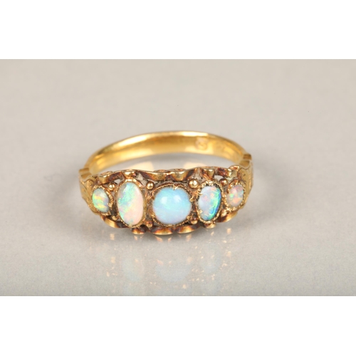 188 - 14ct yellow gold opal ring with 1970s Brutalist style setting, ring size Q, 3.5g gross and a yellow ... 