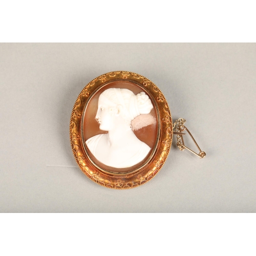 198 - 15ct gold mounted carved cameo shell brooch with portrait of a lady facing left, the border with fil... 