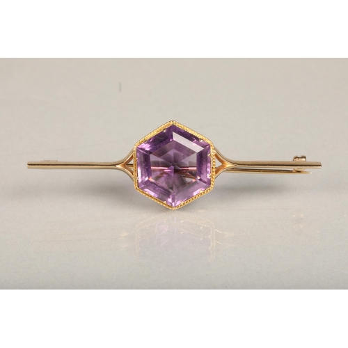 200 - 9ct gold bar brooch set with large hexagonal amethyst frame by rope twist border, 7.4g gross, and a ... 