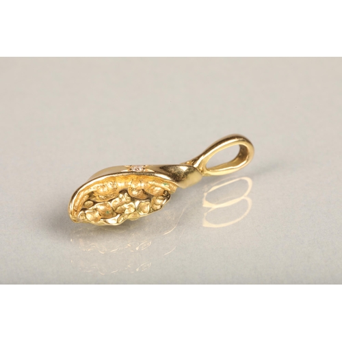 201 - Unhallmarked gold nugget style pendant set with small round diamond, makers mark rubbed possibly 'BT... 