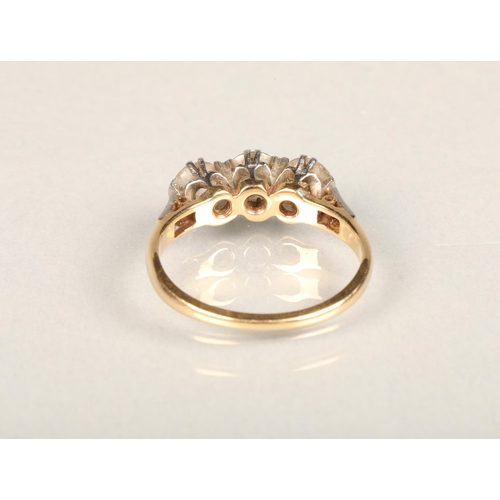 204 - 18ct gold three-stone diamond ring, the central round-cut diamond approx. 0.5ct flanked by two 0.3ct... 