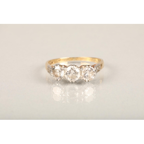 204 - 18ct gold three-stone diamond ring, the central round-cut diamond approx. 0.5ct flanked by two 0.3ct... 