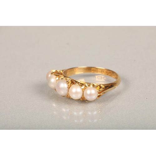 215 - 18ct gold five-stone seed pearl dress ring, ring size N/O, 4.2g.