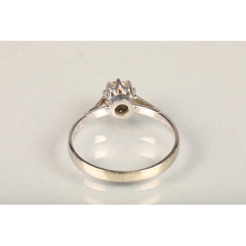 223 - White metal and diamond solitaire ring, the central brilliant cut diamond in eight claw collet setti... 