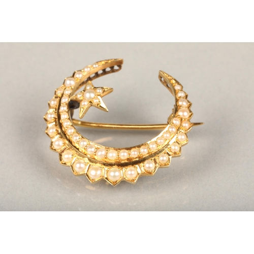 224 - Edwardian 15ct gold and seed pearl brooch, of crescent moon shape form with twin rows of graduating ... 